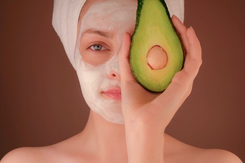 Woman with DIY avocado face mask