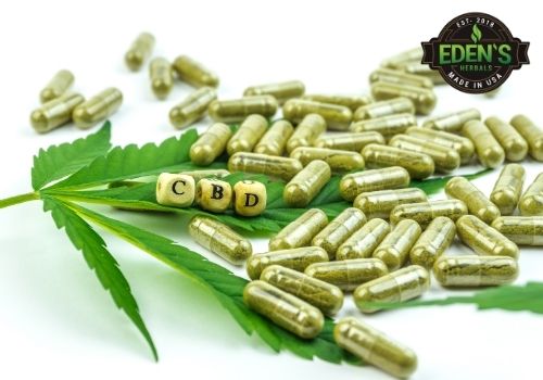 CBD pills and capsules on table