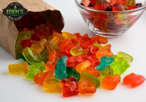 gummy bears spilled out of bag on a table