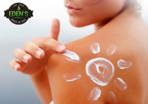 CBD lotion being applied to womans shoulder for improved skin care