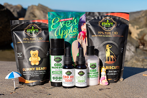 Variety of Eden's Herbals CBD products on the beach