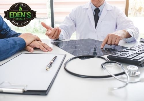 Doctor consulting patient about treating cancer with CBD