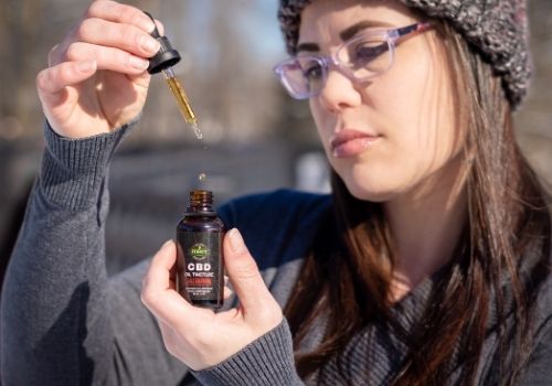 Woman using CBD for improved focus