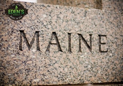 state name Maine in stone wall