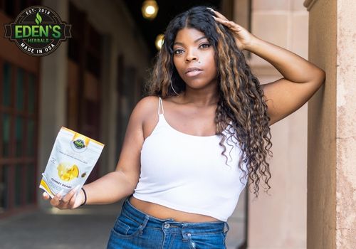 woman holding eden's herbals cbd gummies