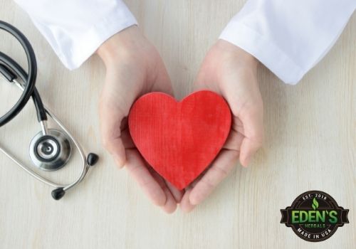 doctor holding heart shape to show safety of CBD