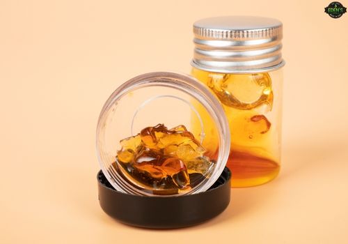 CBD distillate and wax in jars