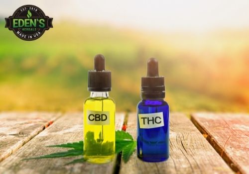 two bottles one labeled cbd one labeled thc