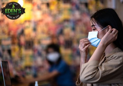 woman putting on her mask