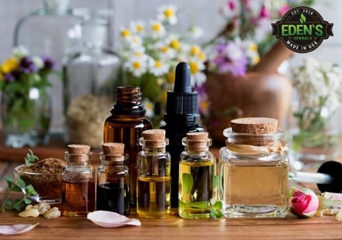 essential oils and herbs on a table